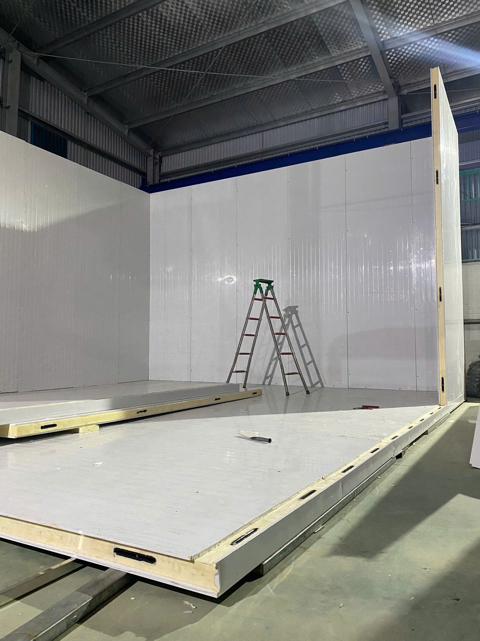 technician repairing refrigeration unit