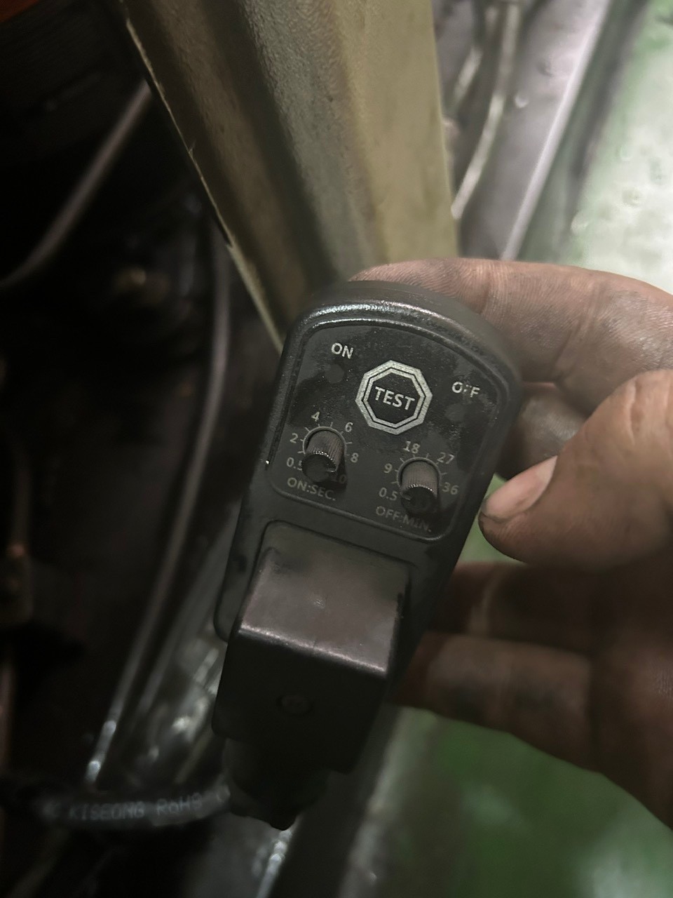 image of a person performing maintenance on an air dryer