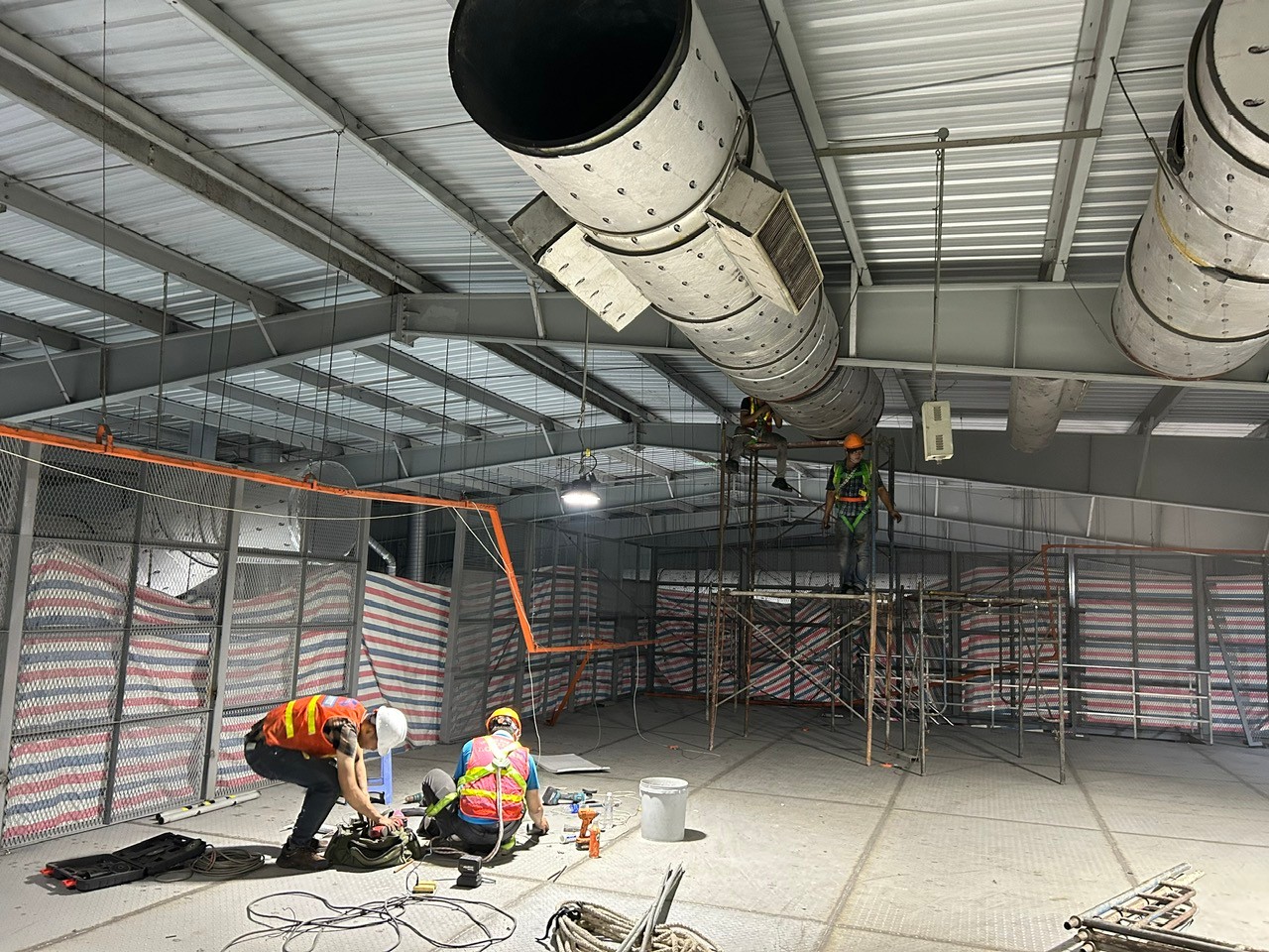 technician inspecting ventilation system